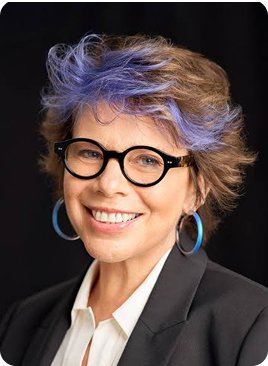 Professional portrait of a smiling woman, suitable for business or social media profiles.
