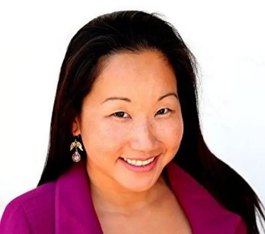 Portrait of a smiling woman, ideal for professional profiles or team introductions.