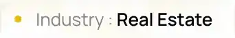 Text label showing “Industry: Real Estate” representing the real estate sector